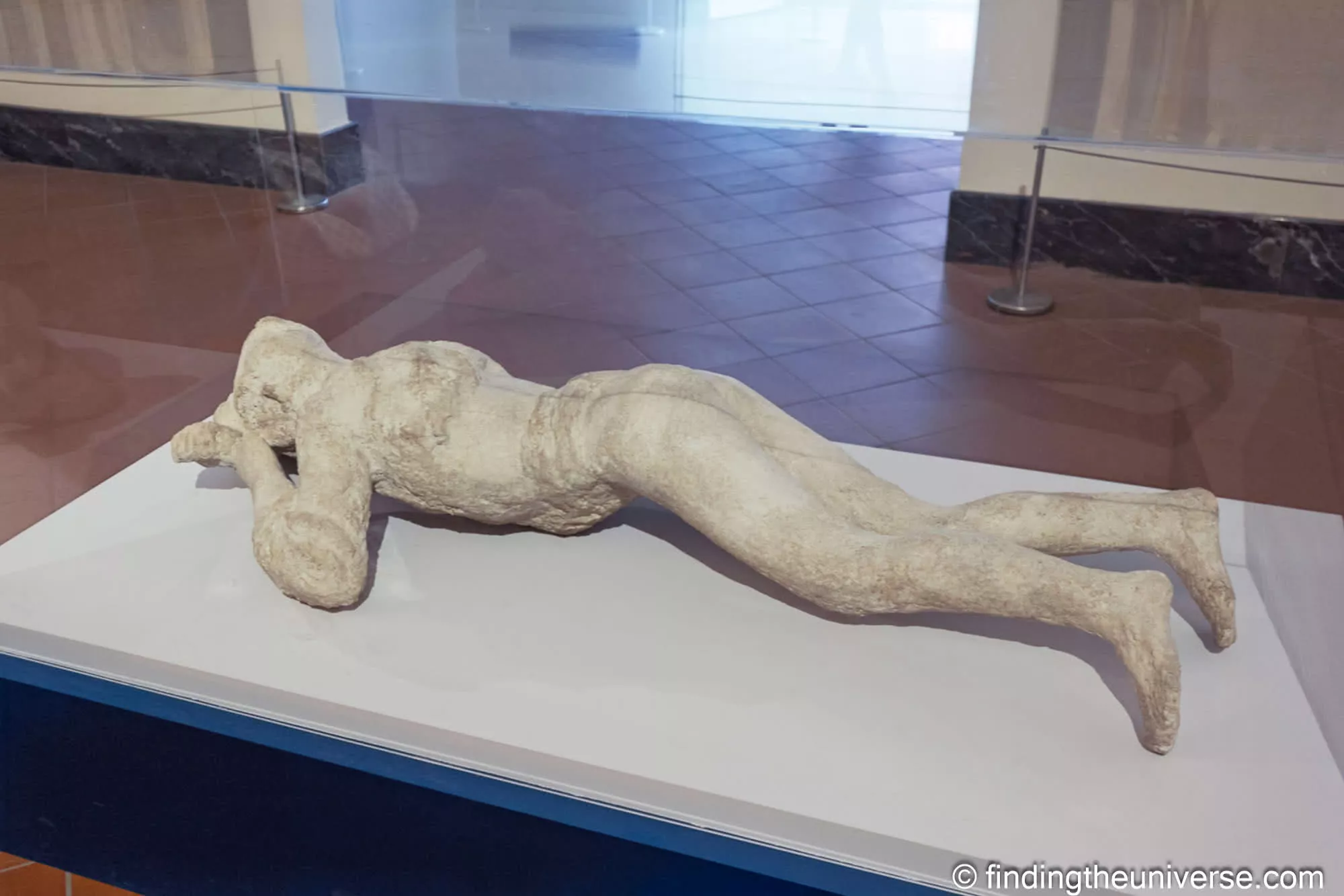 A plaster cast of a Pompeii victim on display at the MANN museum in Naples