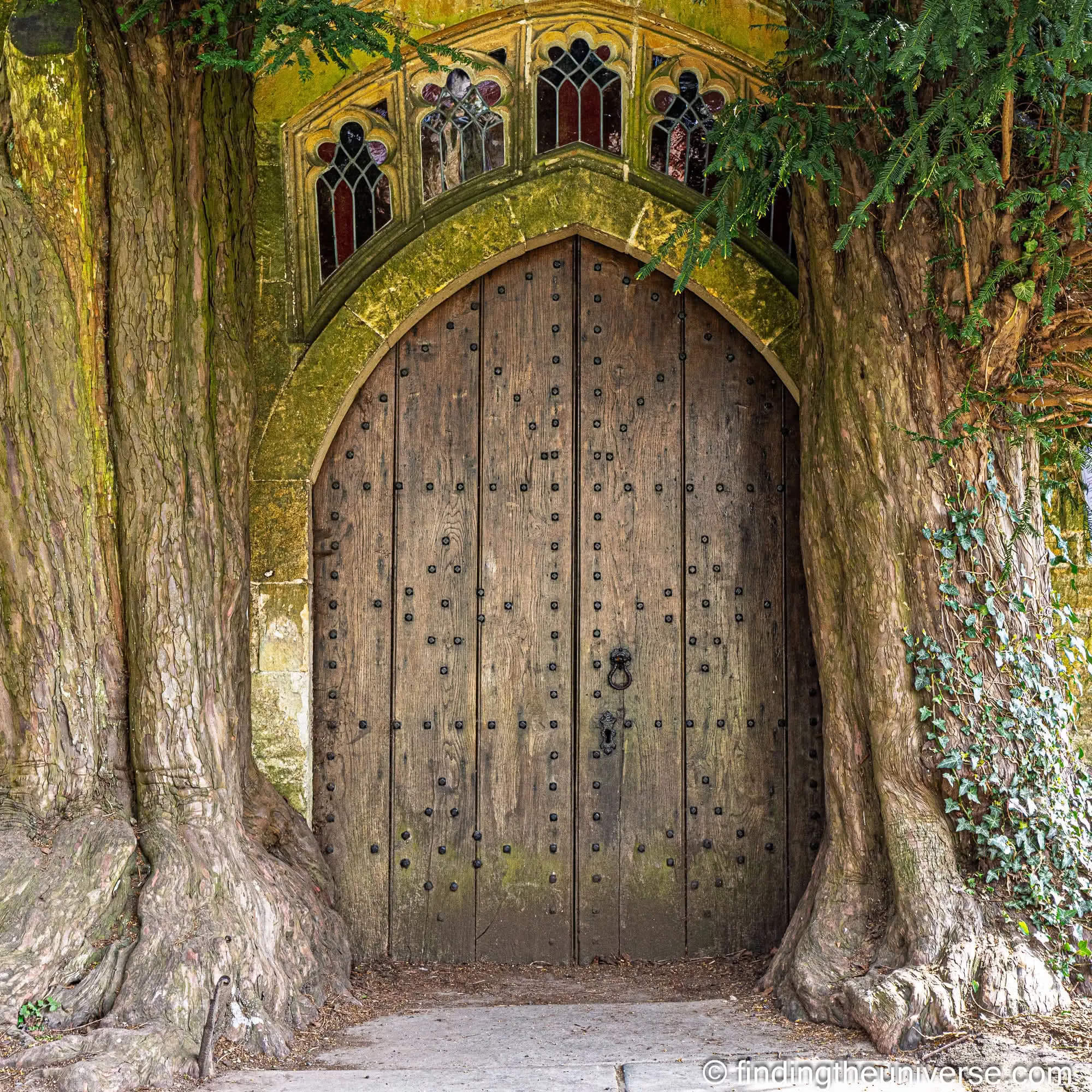 Stow-on-the-Wold church door between two yew trees