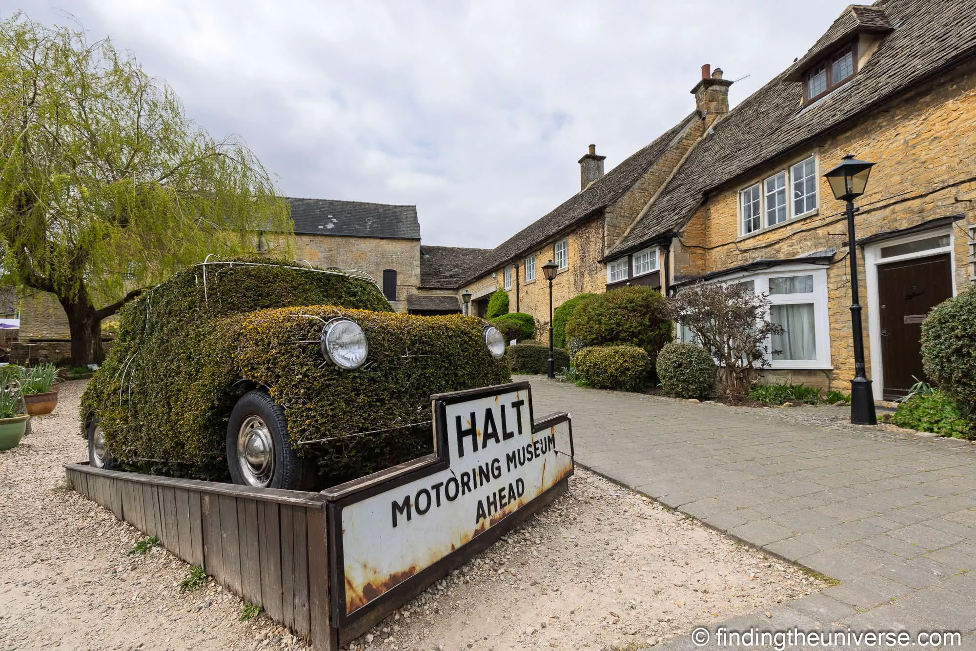 Topiary car and Motoring Museum sign at Bourton-on-the-Water