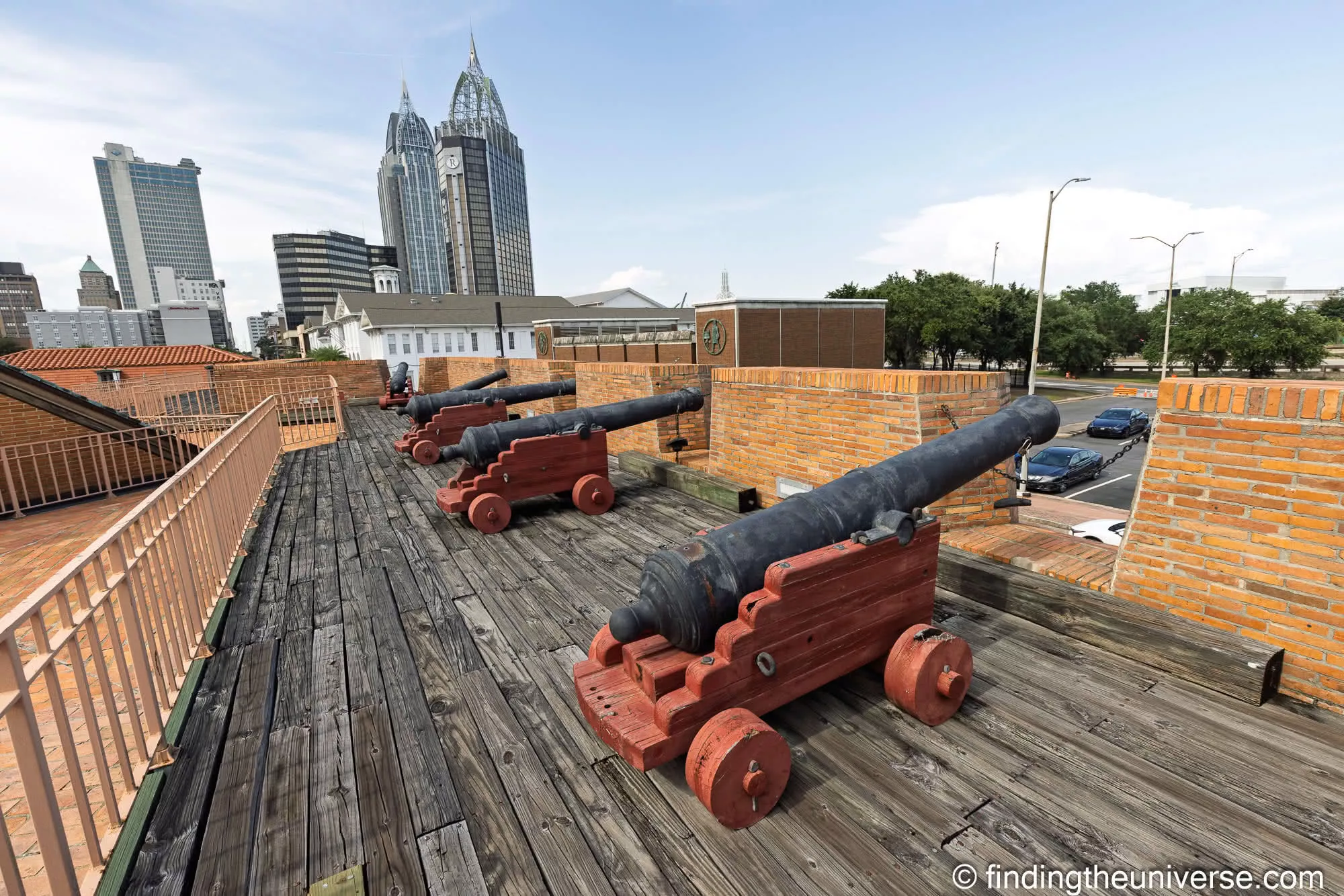 Cannon on the ramparts at Fort Conde, with the Mobile skyline behind