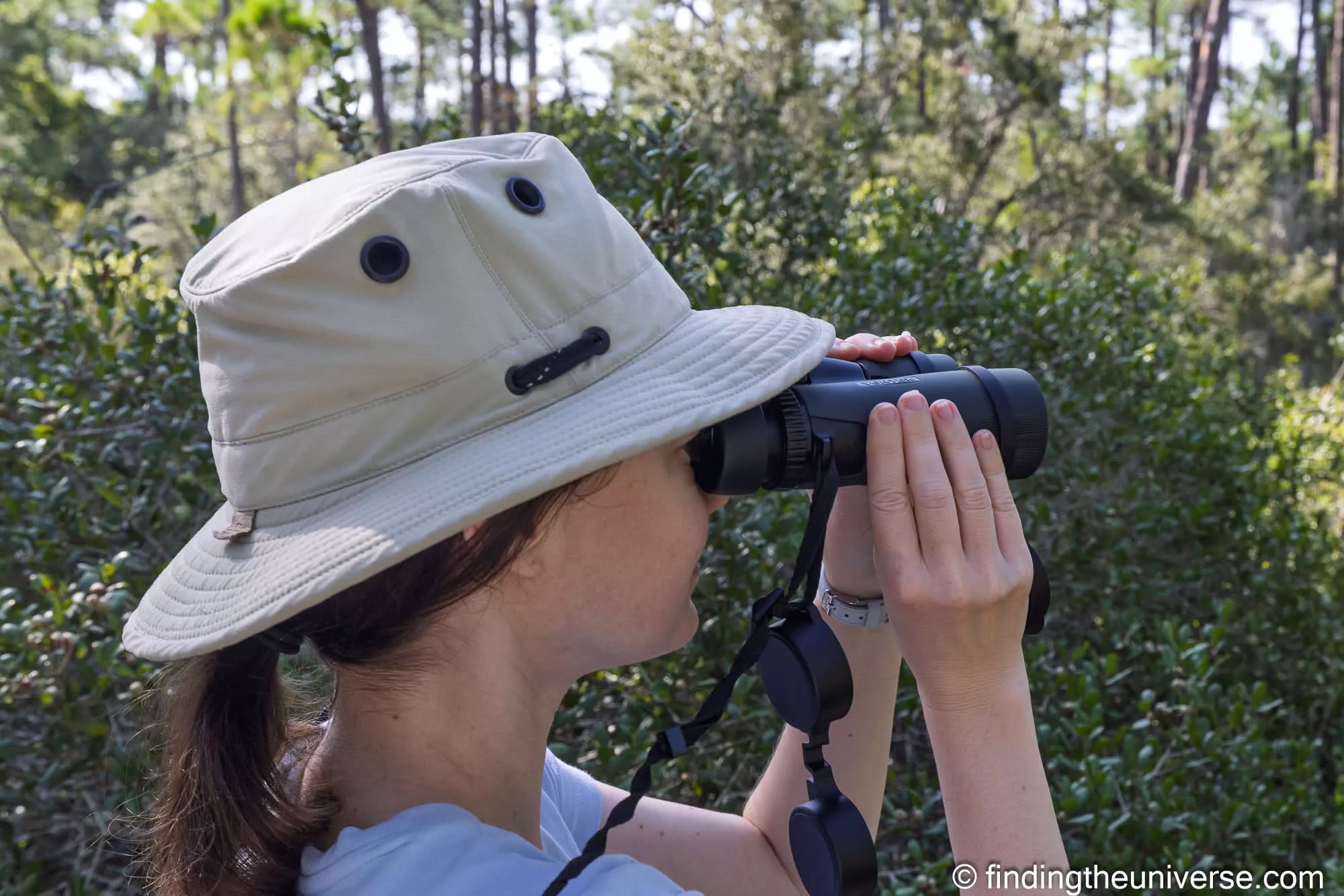 Close-up of Vortex Diamondback binoculars raised to the eye