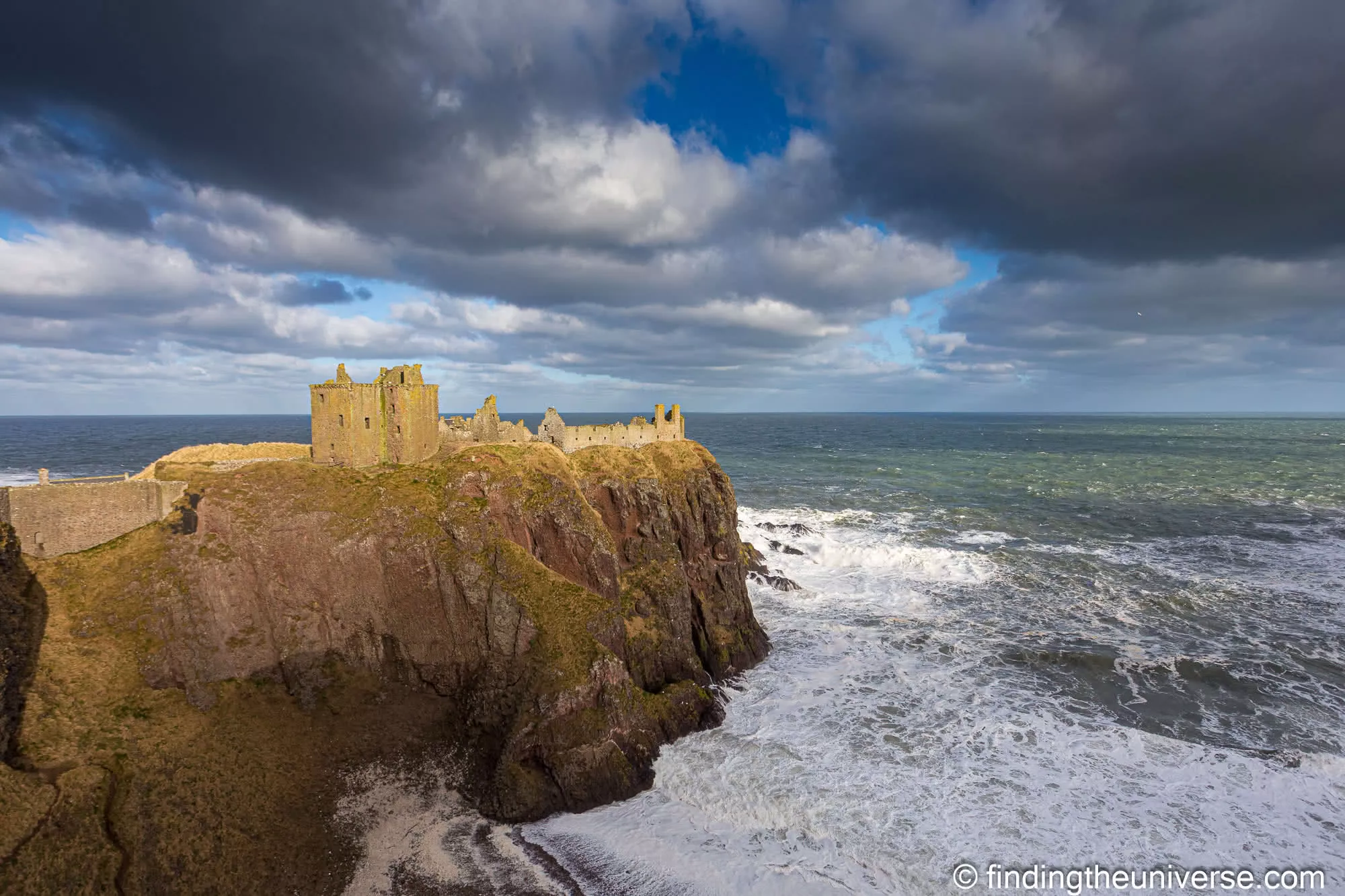 Dunnottar Castle with the sea running