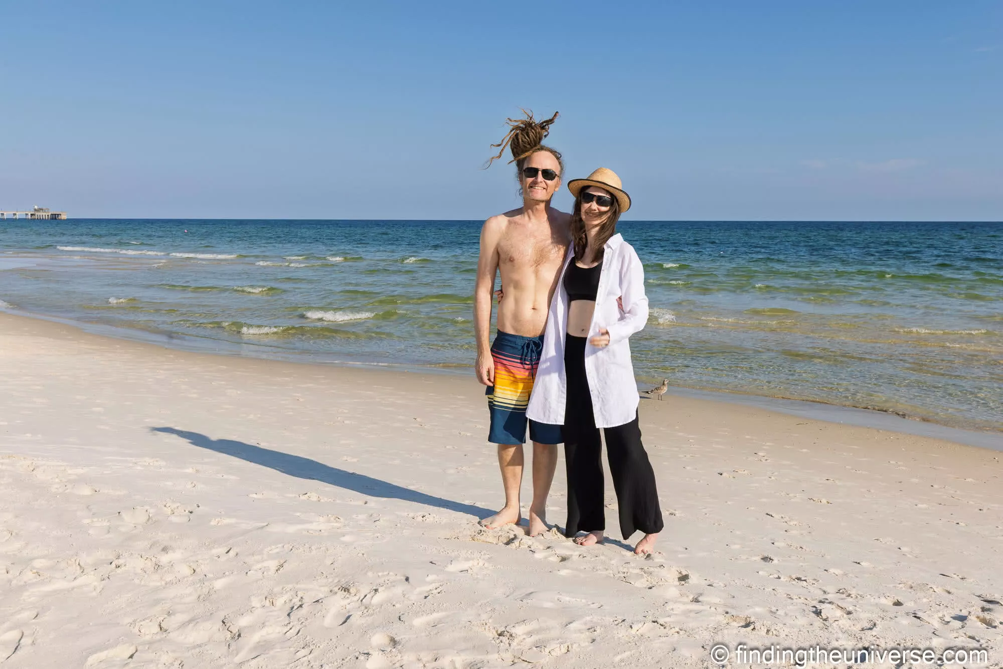 On the sand at Gulf Shores, the state park pier in the distance