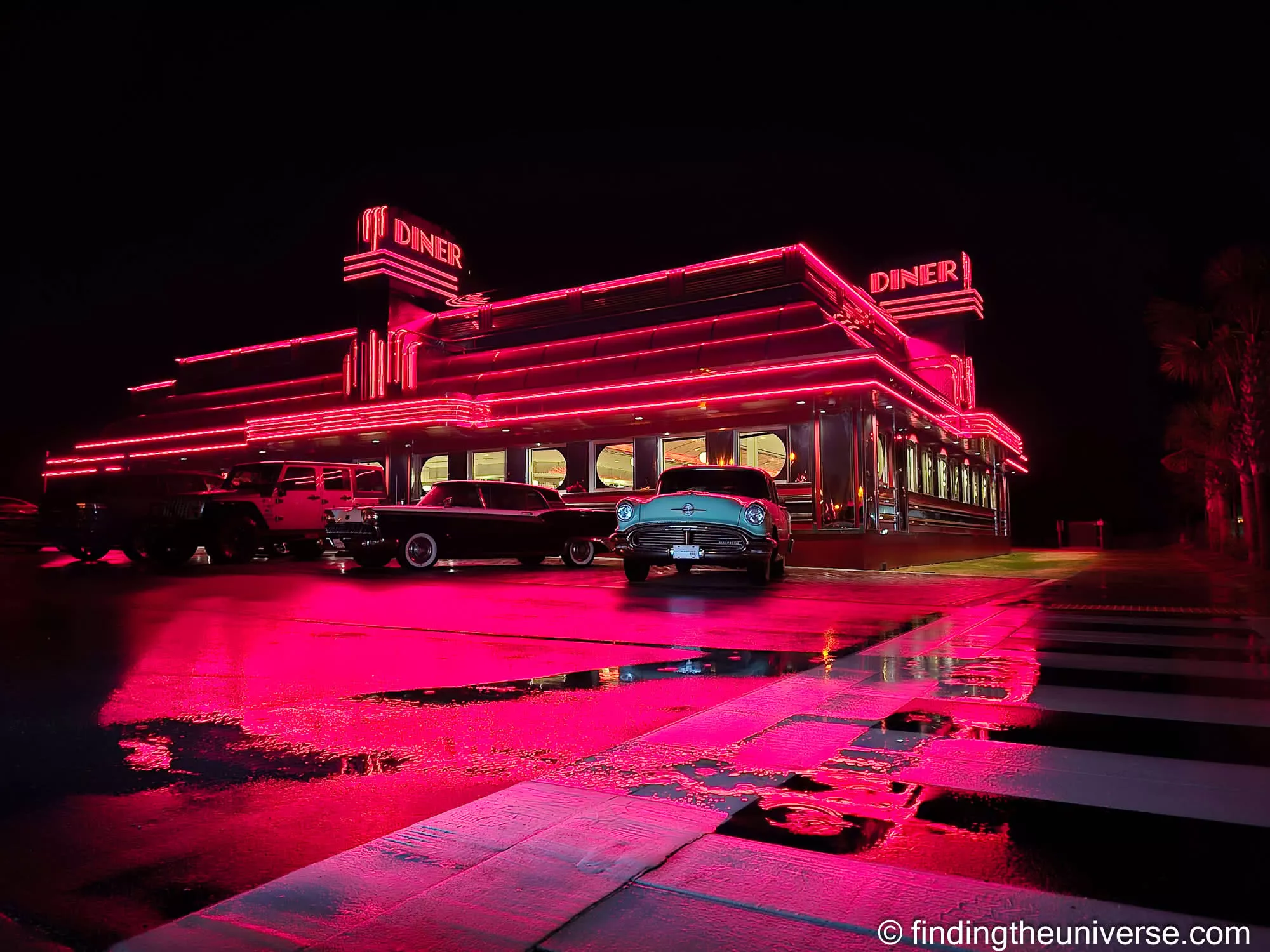 The Sunliner Diner in neon after rain