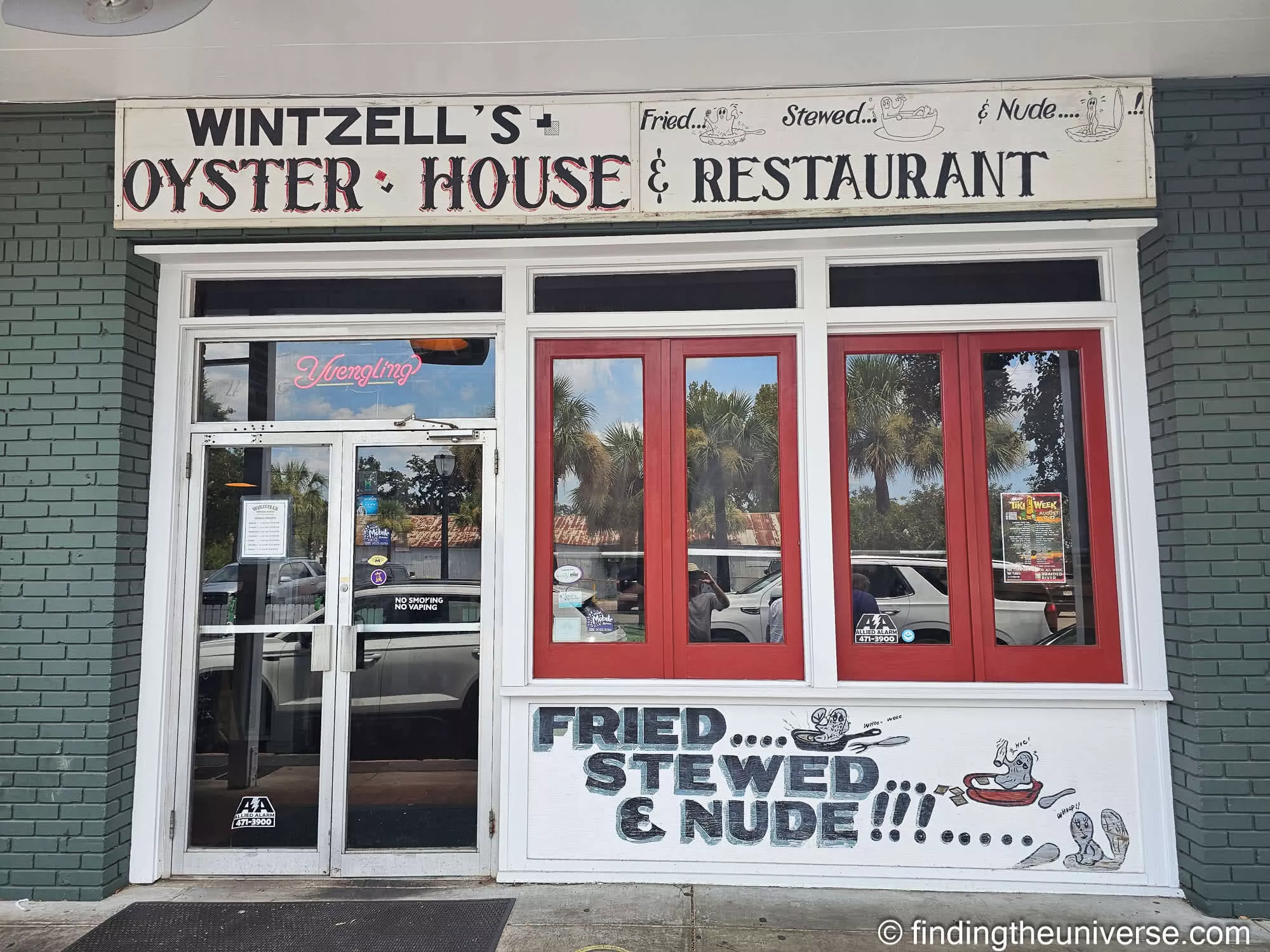 Wintzell's Oyster House and its fried, stewed and nude sign