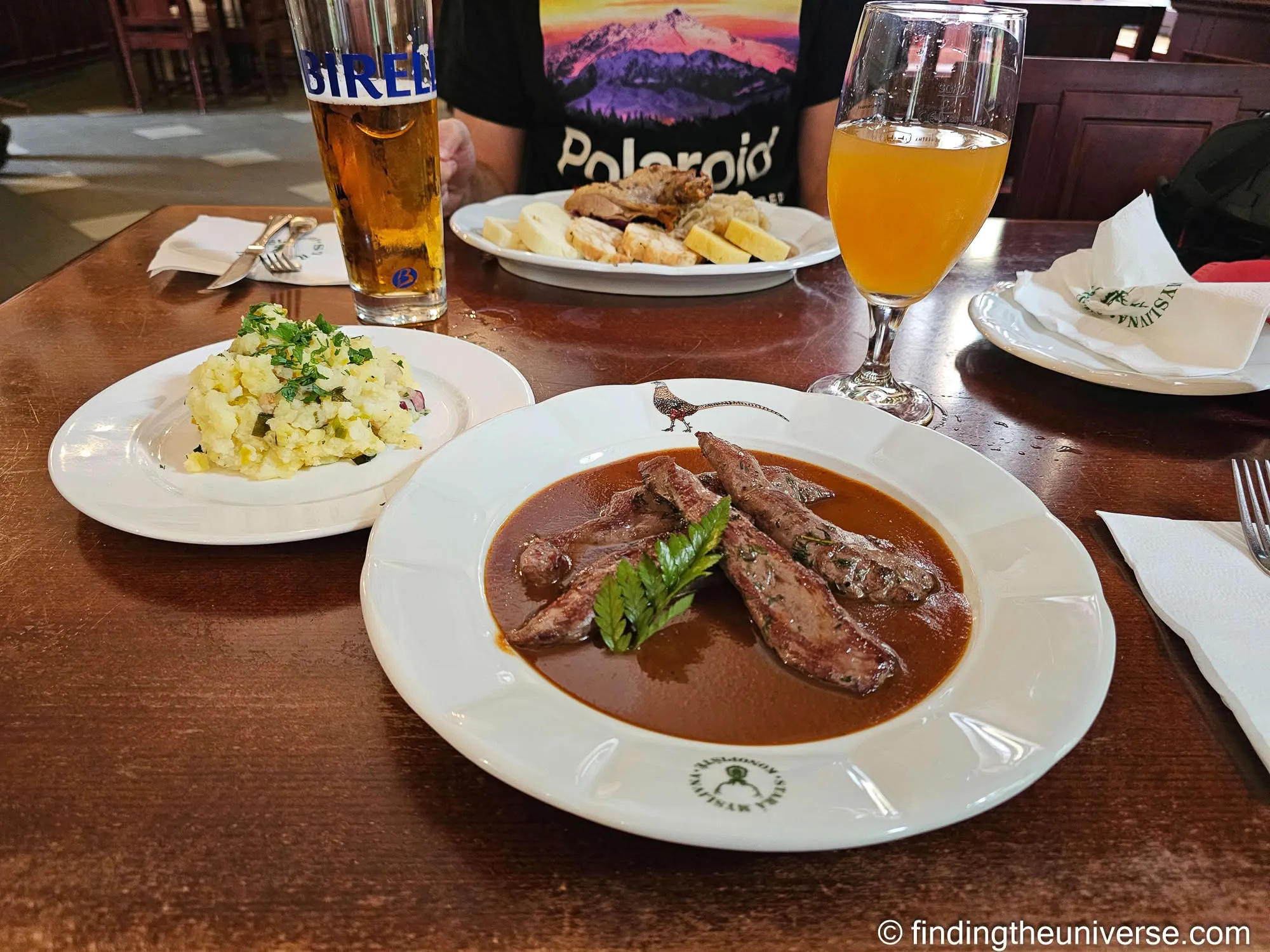 Game in gravy with dumplings and potato salad, Konopiště