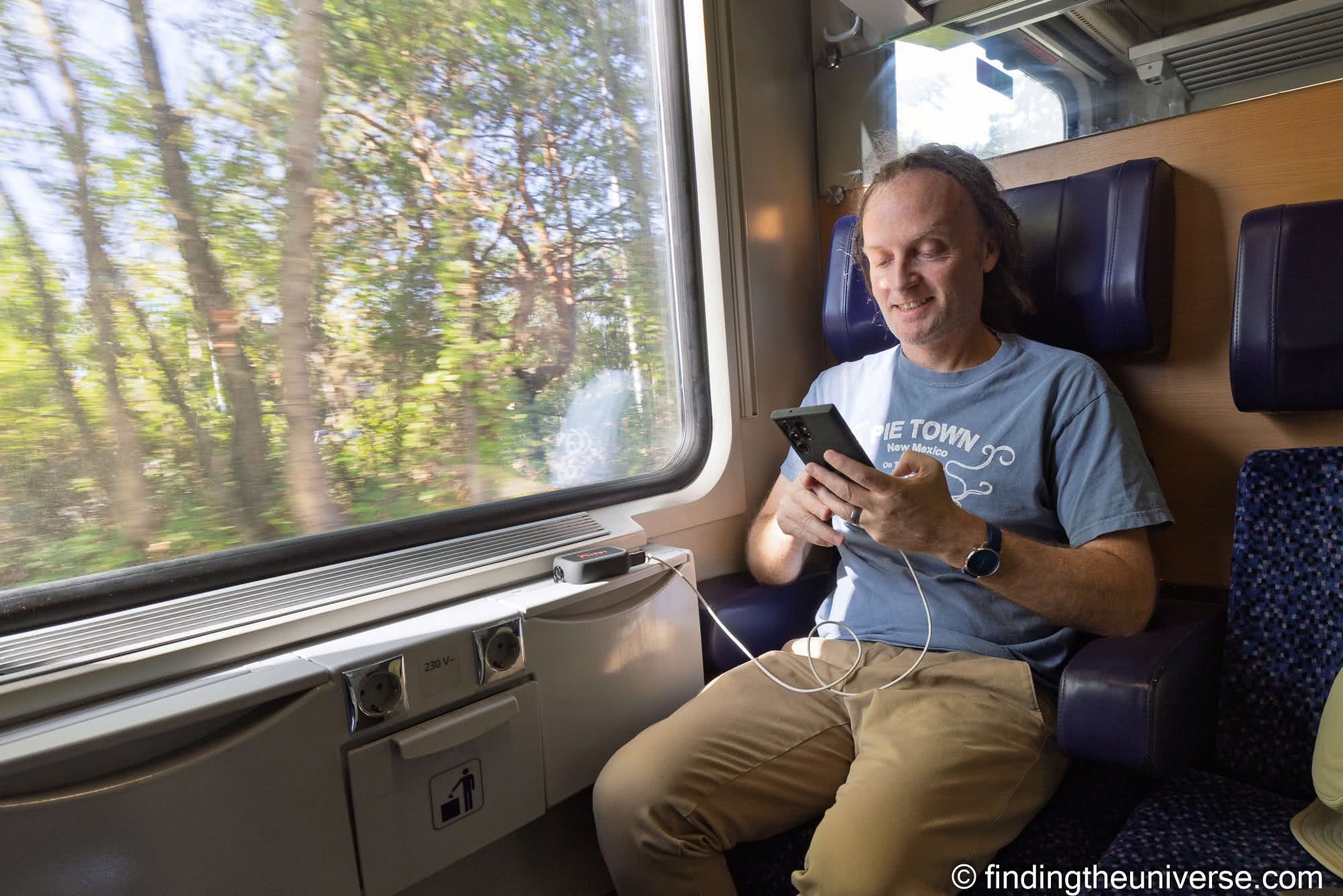 INIU RG-10000 power bank in use on a train in Slovakia