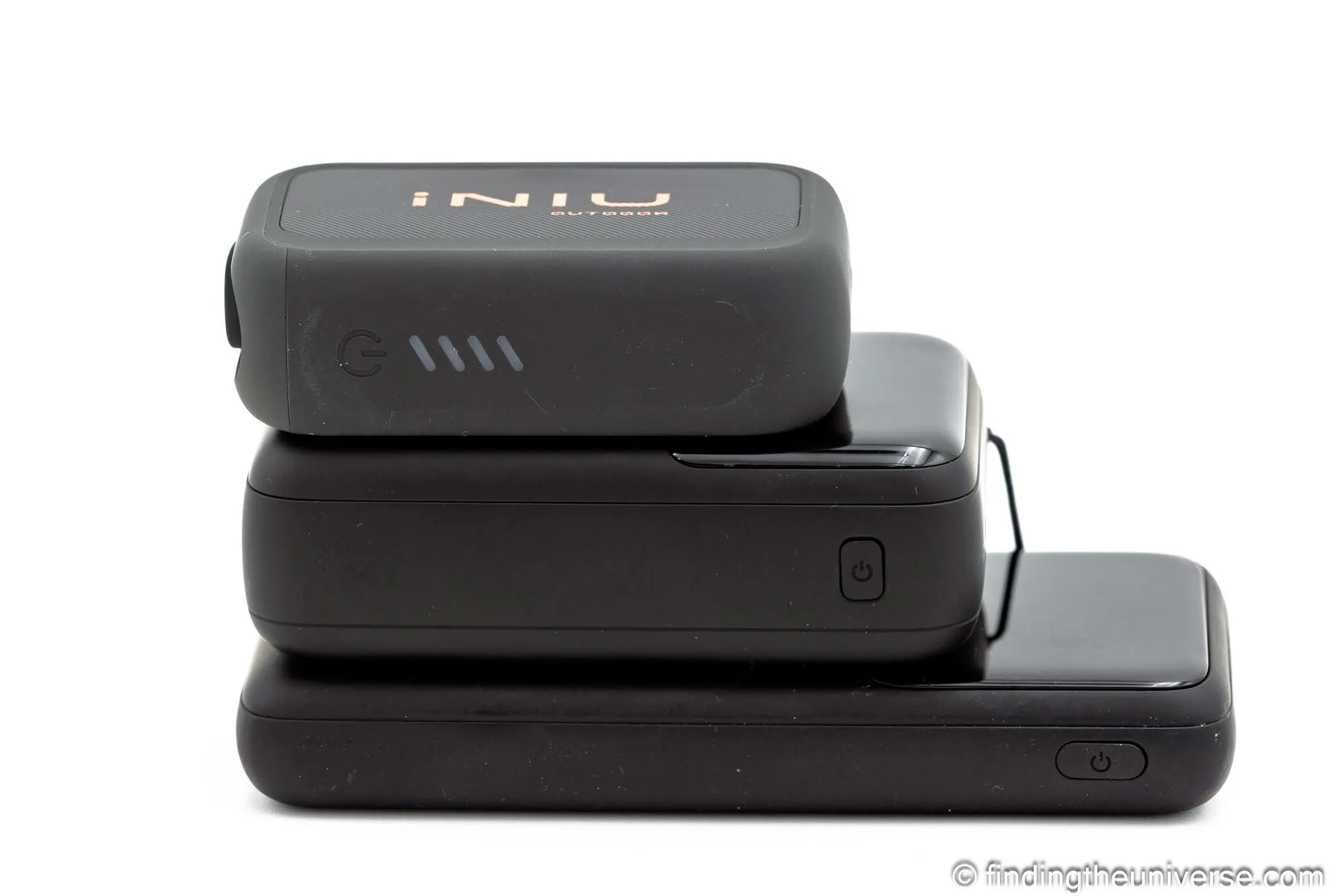 INIU RG-10000 stacked on the older INIU BI-B62 and the INIU P63 to compare thickness