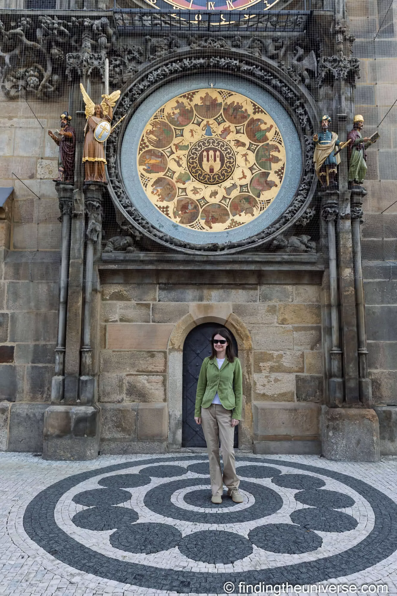 Jess under the Astronomical Clock early in the morning, Prague