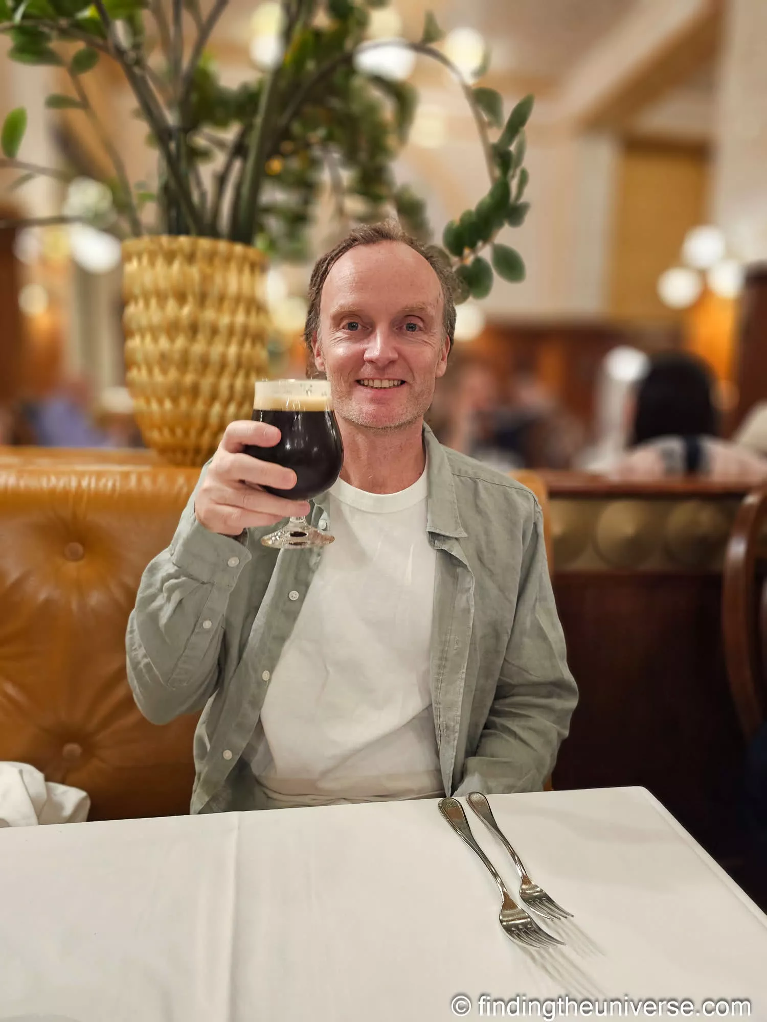 Laurence with a dark beer at Café Imperial, Prague