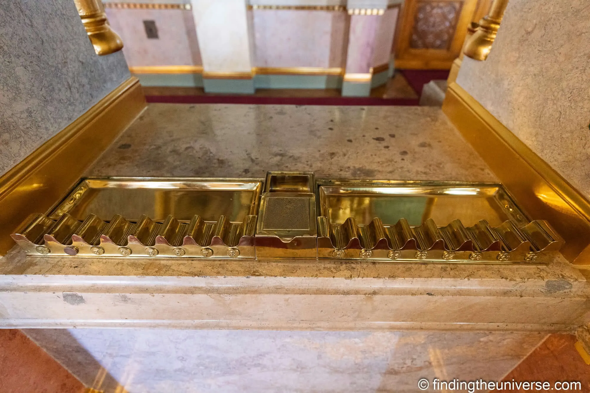 Numbered brass cigar holders in the Hungarian Parliament